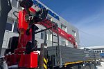 Бортовой грузовик FAW CA 3250 с крано – манипуляторной установкой Sunhunk S-2106.