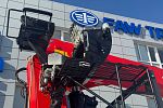 Бортовой грузовик FAW CA 3250 с крано – манипуляторной установкой Sunhunk S-2106.