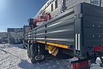 Бортовой грузовик FAW CA 3250 с крано – манипуляторной установкой Sunhunk S-2106.